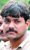 Avdhesh Sharma being produced by the police in New Delhi 