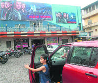 With tickets getting cheaper, Dehradun residents begin to return to cinema halls.