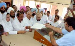 Hans Raj Josan, the Congress candidate for the Jalalabad Assembly seat, files his nomination papers in Ferozepur 