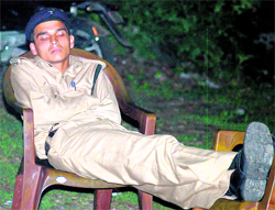 A policeman sleeps while on Kanwar Mela duty in Haridwar late on Wednesday night.