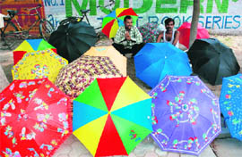 Are you ready for rain? Vendors display umbrellas of various hues and patterns in Karnal.