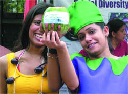 Girls exhibit a brinjal during the first Baingan Mela at Dilli Haat, organised by the Delhi Tourism and NGO Aid India on Saturday.