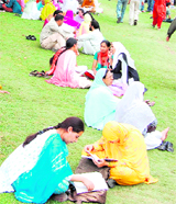 Students wait to appear in the CET in Srinagar on Saturday.