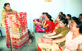 Rajni Sehgal, Superintendent of the Central Jail, addresses teachers during a training programme in Jammu on Saturday.