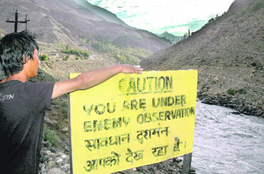 Boards warn of observation by the enemy on the Leh-Kargil-Drass highway
