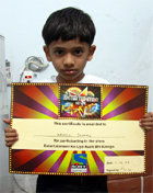 Abhik Jindal displaying the winners certificate.