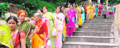 Women devotees throng Tapkeshwar Temple in Dehradun on the second Monday of the month of saawan.