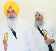 Jathedar Nandgarh Balwant Singh and Jathedar Iqbal Singh of Takht Patna Sahib attend a meeting at Akal Takht in Amritsar on Monday.