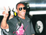 Kobe Bryant waves upon arrival at the Manila International airport on Sunday. Bryant was in the capital for a one day visit to meet kids to inspire, energise and improve their basketball skills.