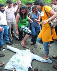 Foreign medical graduates protest against union health minister Ghulam Nabi Azad, seeking recognition of their degrees by the Medical Council of India, near the Parliament House in New Delhi