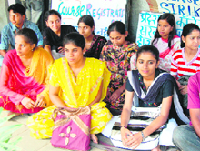 Students of add-on course sitting on hunger strike at a Dharamsala college on Tuesday.