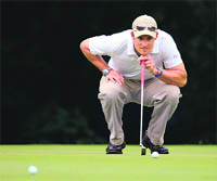 England captain Andrew Strauss during the Ashes Golf Challenge at Stoke Park Club in Buckinghamshire on Tuesday