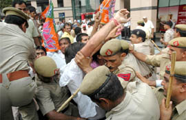 Activists of the BJP Yuva Morcha hold a demonstration against USAs Continental Airline over the frisking of former President Abdul Kalam by the company in Gurgaon on Wednesday.