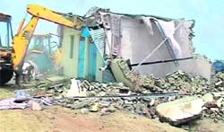 An illegal structure being demolished in Siddipur village in Jhajjar district.