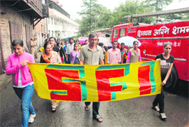 A silent protest march being taken out by SFI activists at Shimla on Thursday. 