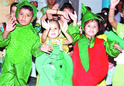 Children perform while celebrating Green Day at Sun Valley School in Amritsar. 