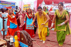 Girls presenting a cultural programme during the Teej celebrations organised at Swami Vivekanand Girls College in Bathinda on Friday.