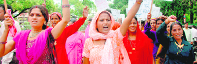 Hill women hold a rally in Dehradun on Friday to register their protest against liquor vends.
