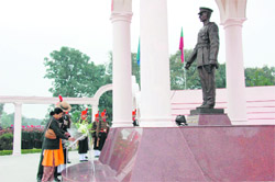 Dhanalakshmi, mother of Major Sandeep Unnikrishnan who died fighting terrorists in Taj Hotel in November 2008, pays homage to martyrs at the War Memorial in IMA.