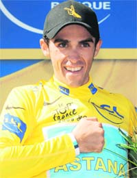 Kazakh cycling team Astanas leader Alberto Contador of Spain, exalts on the podium