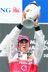 Lewis Hamilton celebrates after winning the Hungarian GP on Sunday. 