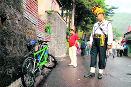 A new model of a bike attracts attention of everyone on the Mall at Shimla.