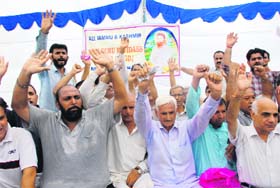 Members of the All-Jammu and Kashmir Guru Ravidass Sabha protest in Jammu