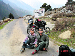 Saurabh Chopra biking with a friend in Sangla valley