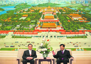 Chinese Vice-President Jia Qinglin (right) with Taiwan's Kuomintang (KMT) party chairman Lien Chan in Beijing on Monday. Taiwan President has received a congratulatory message from his Chinese counterpart after being elected leader of the island's ruling KMT party, state-run media said.