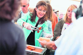 Alaska Governor Sarah Palin serves hotdogs at the annual Governor's Picnic in Fairbanks, Alaska, on Sunday. 