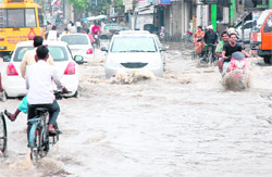 A view of a road in Jalandhar after rain lashed the city on Tuesday. Tribune photo: Malkiat Singh