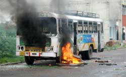 Dera Sacha Sauda followers torched a PRTC bus at Mansa on Wednesday following the death of a Dera activist when a stray bullet hit him during the protest.