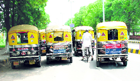 Autorickshaws block the road to the PGIMS in Rohtak.