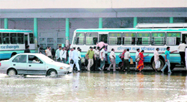 Water accumulated at the Gurgaon main bus stand three days after a spell of rain indicates the sorry state of basic infrastructure in the millennium city.