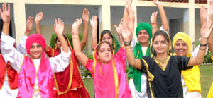 Students of Red Cross School for Deaf celebrate Teej in Jalandhar.  