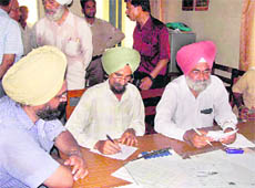 Vigilance team of FCI, Chandigarh, verifies the records of Markfed godowns at Jagraon.
