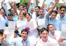 Students in a jubilant mood after receiving degrees at Indo-Swiss Training Centre in CSIO, Sector 30, Chandigarh on Friday.