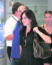 Ana Elena and Luis Antonio Massa, Felipe Massa's parents, arrive to visit their son at Budapest's AEK hospital on Friday. 