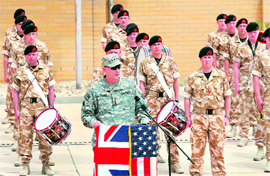 US General Ray Odierno, Commanding General of Multi-National forces in Iraq, addresses a ceremony marking the pullout of British troops from Iraq at Basra airport on Friday.