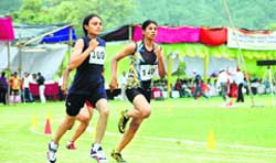 Girls participate in 400m at the 21st North Zone Athletics Championship in Dehradun