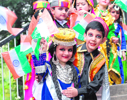 Students of St Edwards School with Tri-colour before their performance at the school function in Shimla on Saturday.