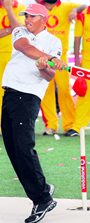 McLaren Mercedes' British driver and current Formula One World champion Lewis Hamilton plays cricket during a promotional event in New Delhi Saturday.