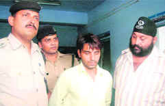 The accused in police custody in Haridwar on Sunday.