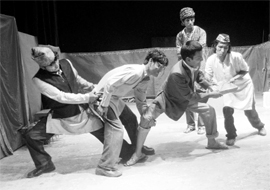 Artistes staging a play Demonstration based on Munshi Prem Chands story on the occasion of his birth anniversary at the Gaiety Theatre in Shimla.