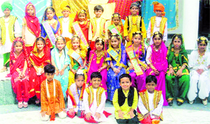 Tiny tots of Peace Public School celebrate Teej in Ludhiana on Saturday.