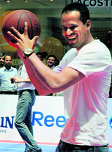 Yusuf Pathan plays basketball with his fans at Ambi Mall in Gurgaon on Sunday.