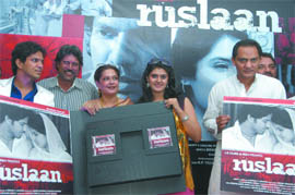 (From left) Actor Javed Ali with former cricketer Kapil Dev, actress Moushmi Chatterjee, her daughter Meghaa and former cricketer Md Azharuddin promote film Ruslaan in New Delhi on Monday.