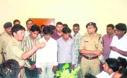 SSP Sanjay Gunjiyal with the seven suspects in the BHEL AGM murder case in Haridwar