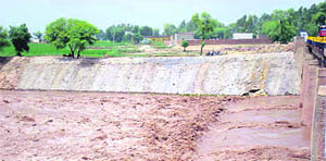 A view of the support walls of the Ghaggar Canal which have been damaged.