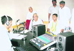 Chief Minister Bhupinder Singh Hooda records his message at the community radio station set up on the CDLU campus in Sirsa. 